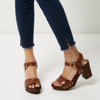 Brown leather strappy clogs